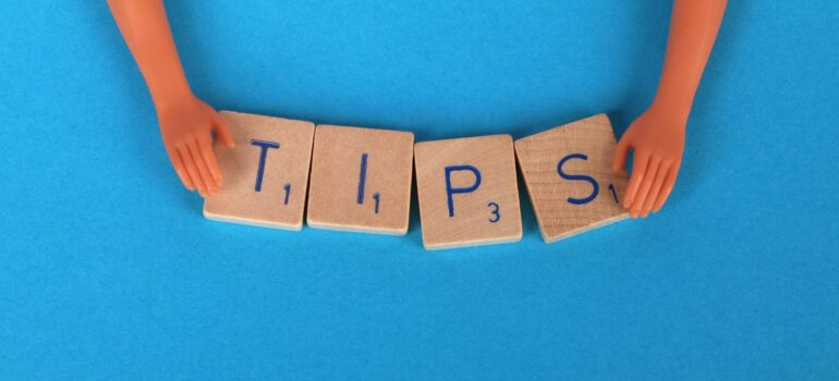 Tips letter on a blue surface